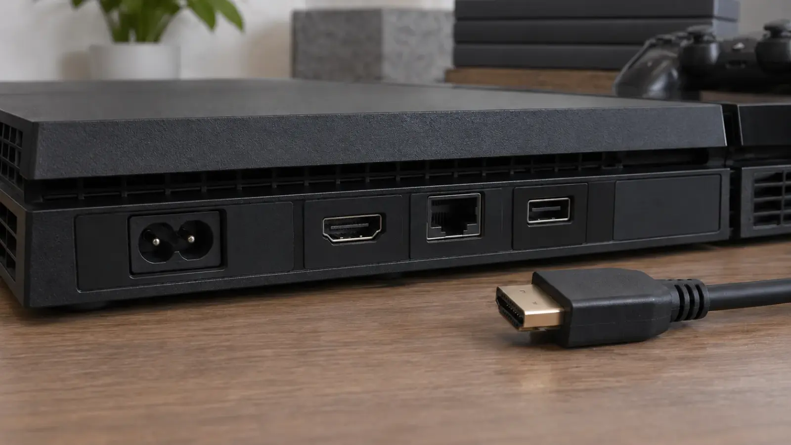 Задний HDMI-видеовыход низкой игровой консоли и отключённый кабель.